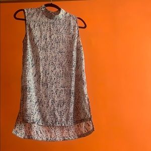 Cream blouse with specks